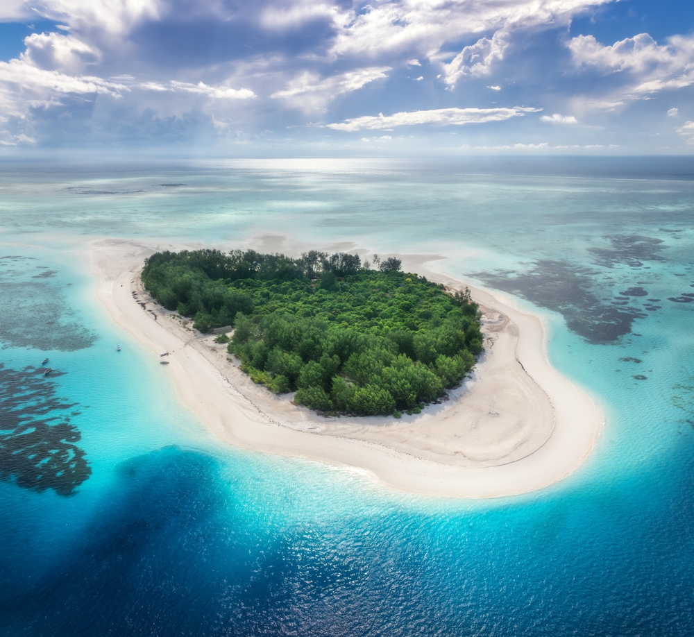Aerial view of Mnemba Island and blue ocean near Zanzibar